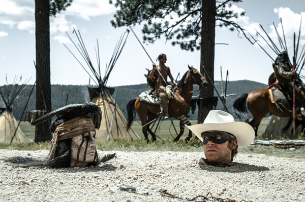 A precarious moment for Tonto (Depp) and Lone Ranger (Hammer) in THE LONE RANGER