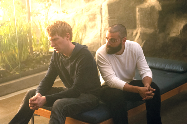 Caleb Caleb (Domhnall Gleeson), and Nathan (Oscar Issac) talk about their next move in Ex Machina