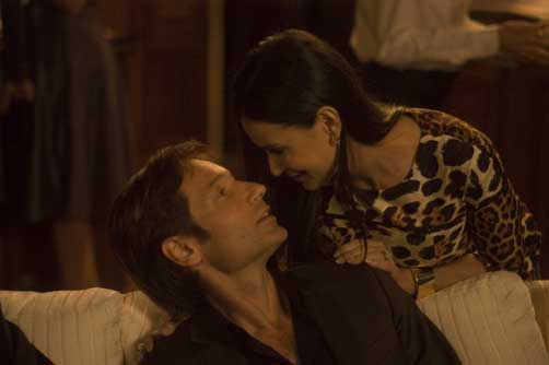 Demi Moore as Kate and David Duchovny as Steve heads of the huckster household