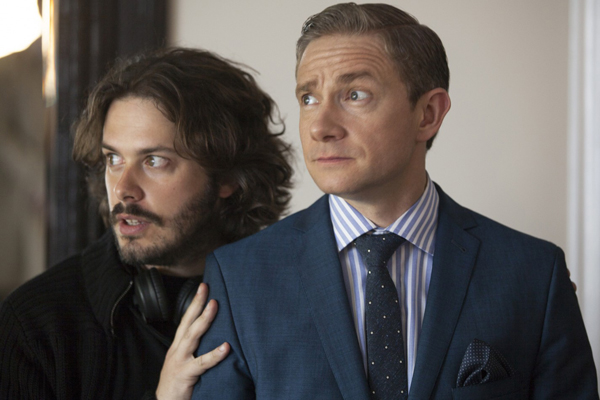Director Edgar Wright positions Martin Freeman on the set