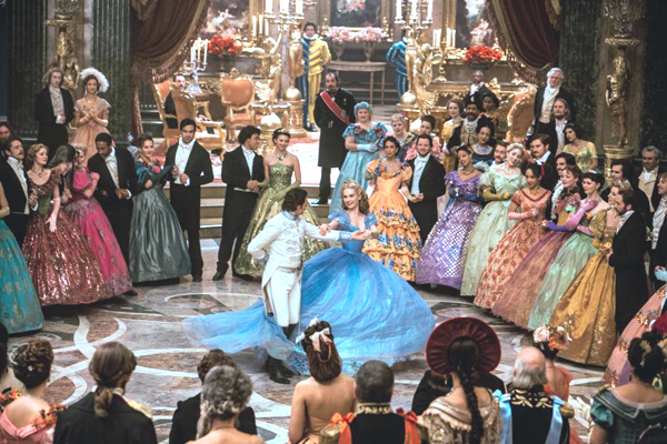 Ella (Lilly James) dances at the ball with the Prince (Richard Madden)