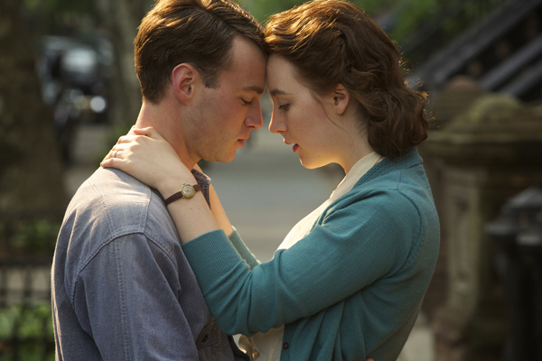 Emory Cohen as "Tony" and Saoirse Ronan as "Eilis" in BROOKLYN. Photo by Kerry Brown. 