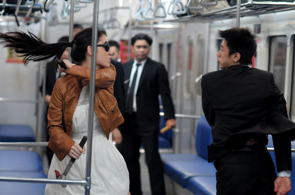 Hammer Girl (Julie Estelle) faces off against the Japanese Mafia
