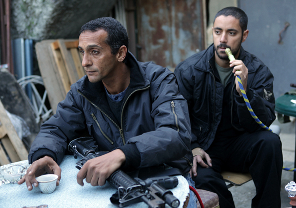 Hitham Omari as Badawi pausing for tea in BETHLEHEM