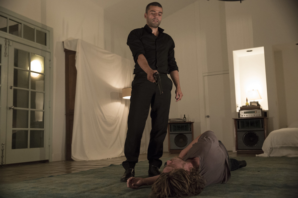 Jack (Oscar Issac) gets the drop on Tom (Garrett Hedlund) in in MOJAVE