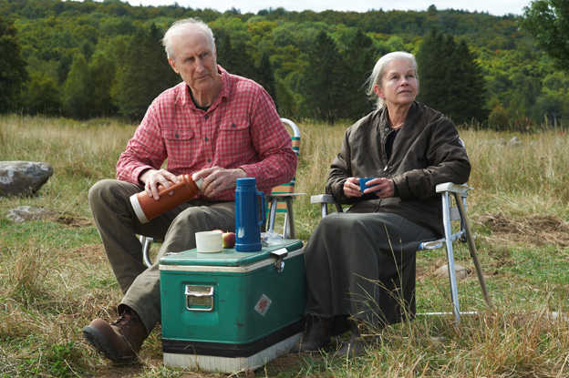 ames Cromwell as Craig and Genevieve Bujold as Irene in STILL MINE