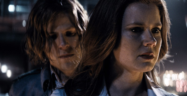 Jesse Eisenberg as Lex Luthor and Amy Adams as Lois Lane