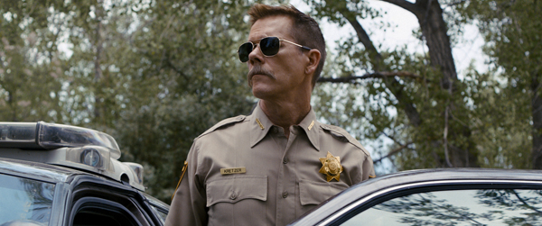Kevin Bacon as Sheriff Kretzer