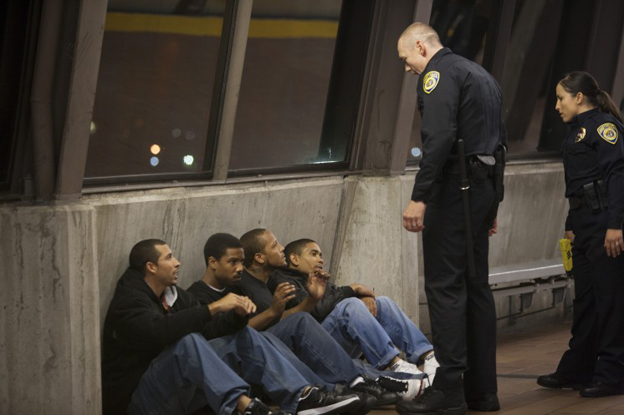 Michael James, Michael B. Jordan, Trestin George, Thomas Wright, Kevin Durand and Alejandra Nolasco at the actual site where the incident took place at Fruitvale Station