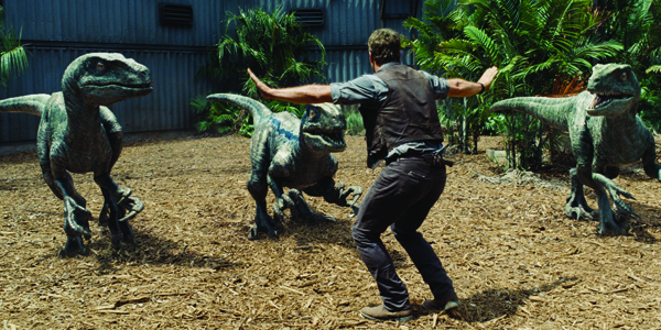 Owen (Chris Pratt) tries to control his Velociraptors