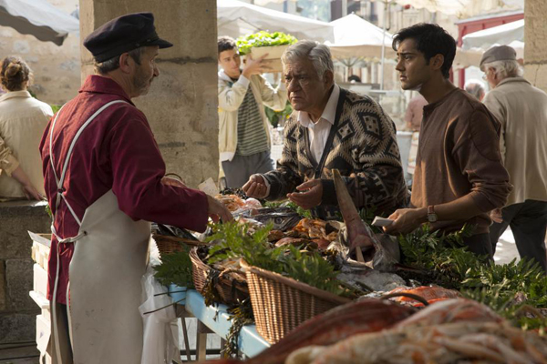 Papa Kadam (Om Puri) with his son Kassam (Manish Dayal