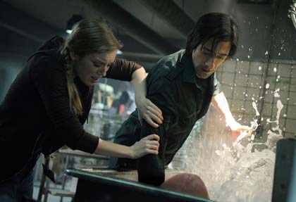SARAH POLLEY as Elsa Kast and ADRIEN BRODY as Clive Nicoli
