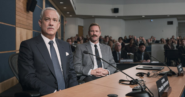 TOM HANKS as Sully and AARON ECKHART as Jeff Skiles in "SULLY"