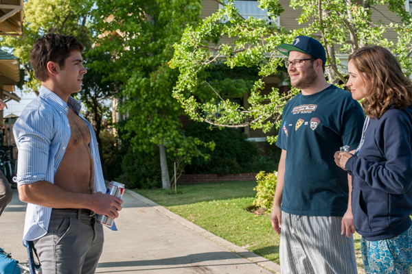 Mac (Rogen) and Kelly Radner (Byrne) meet with Teddy (Efron)