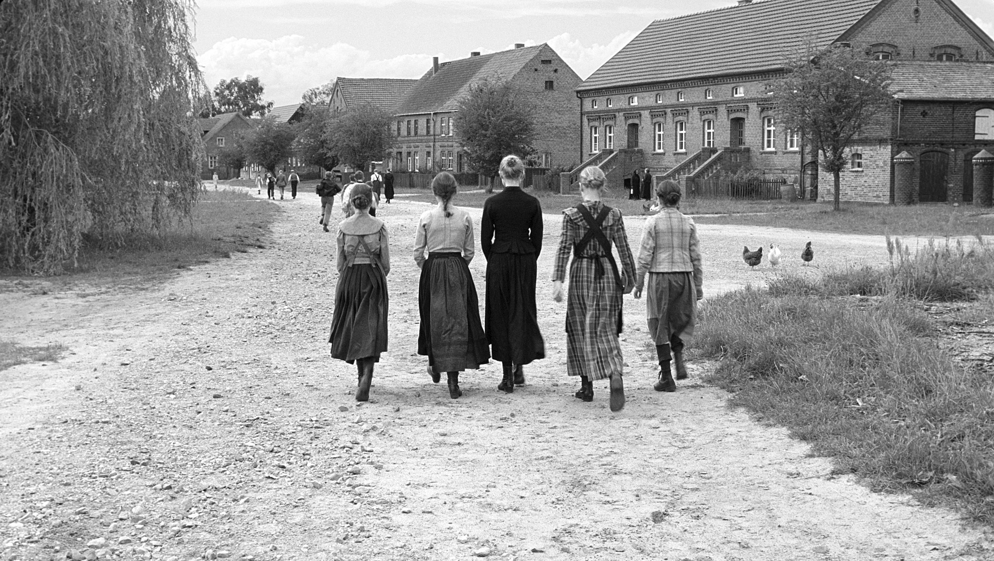 Younsters enter their German village pre WWI