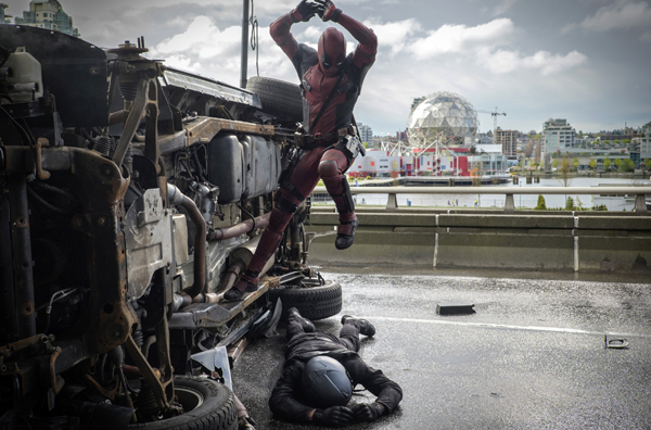 Deadpool (Ryan Reynolds) pounces on an adversary