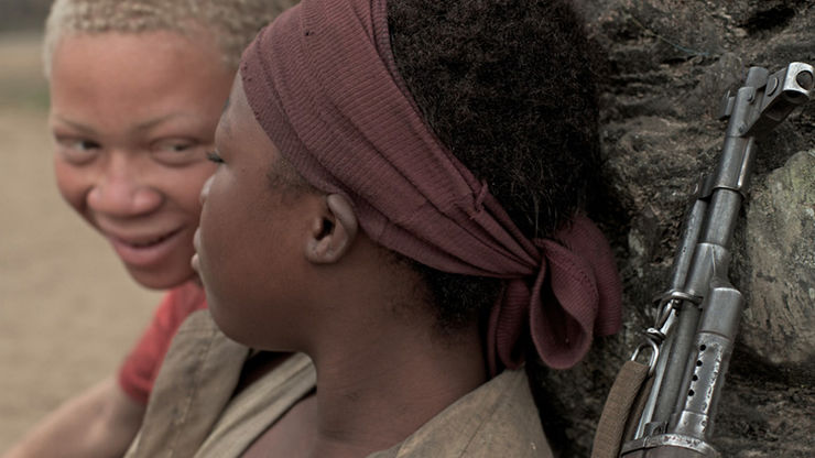 Komona (Rachel Mwanza) with a friendly rebel in WAR WITCH